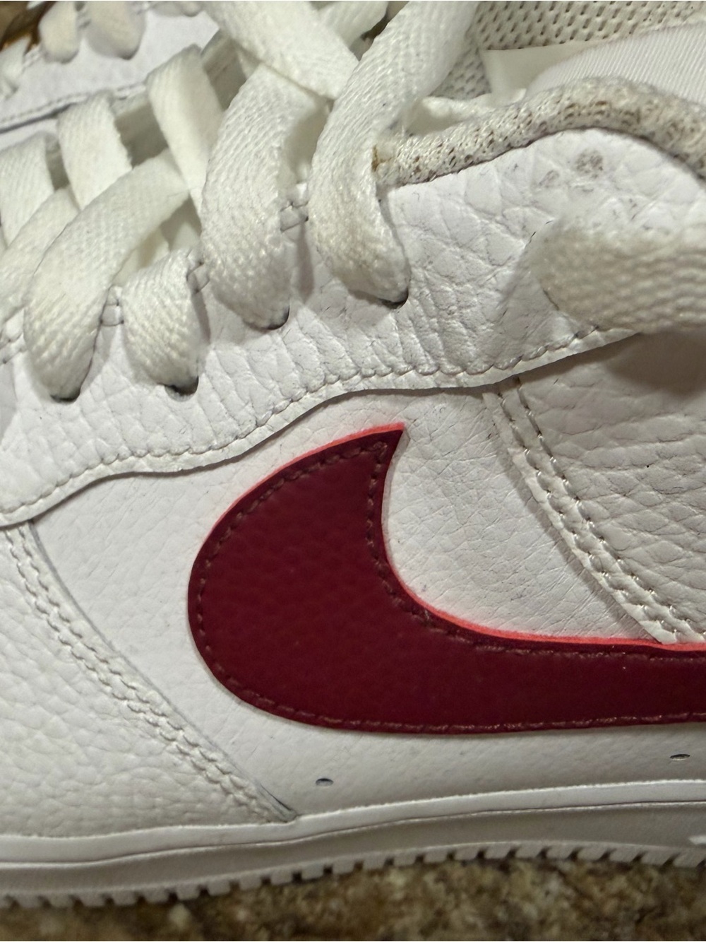 Nike men’s  White Sneakers with Red Swoosh. 60.00